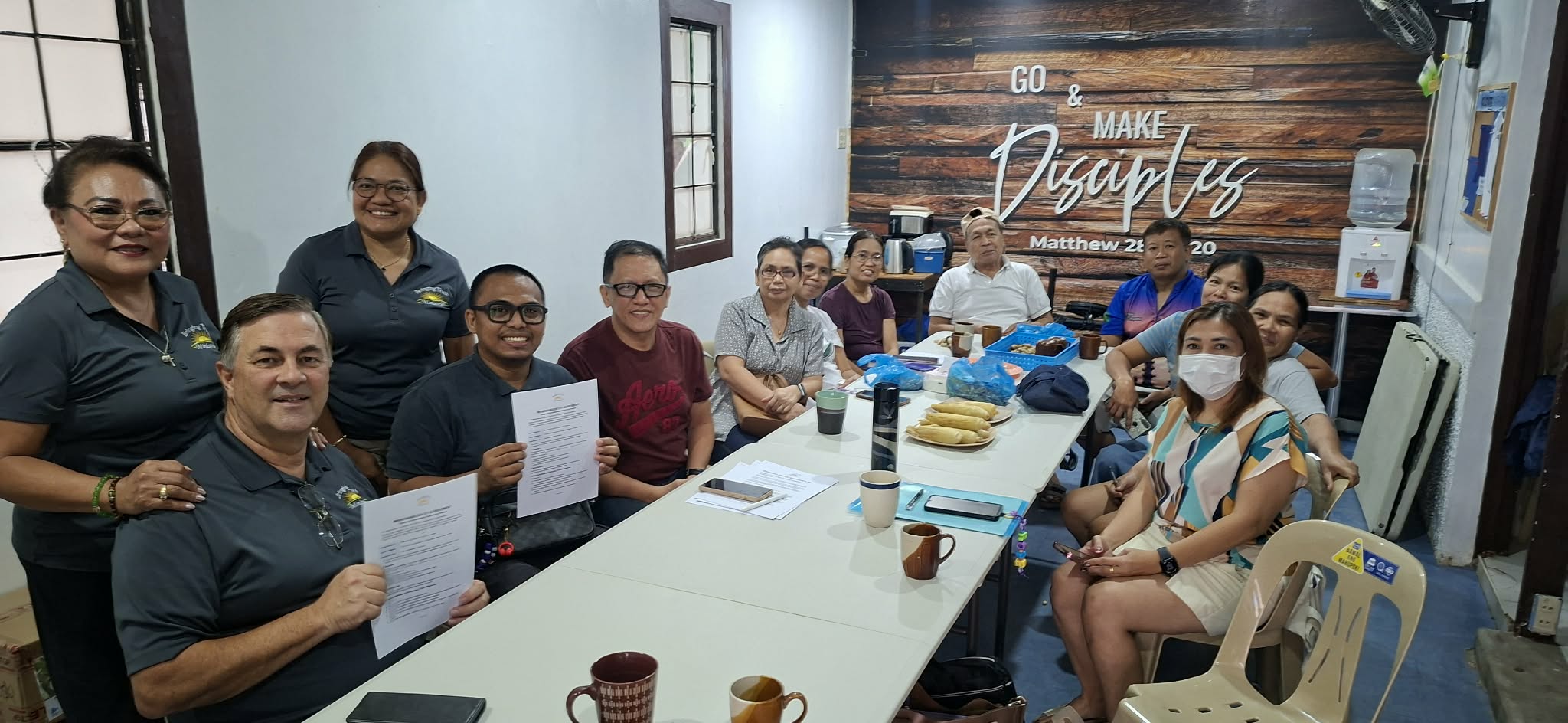 Bringing Truth Ministries and MCTV church celebrating their first MOA signing