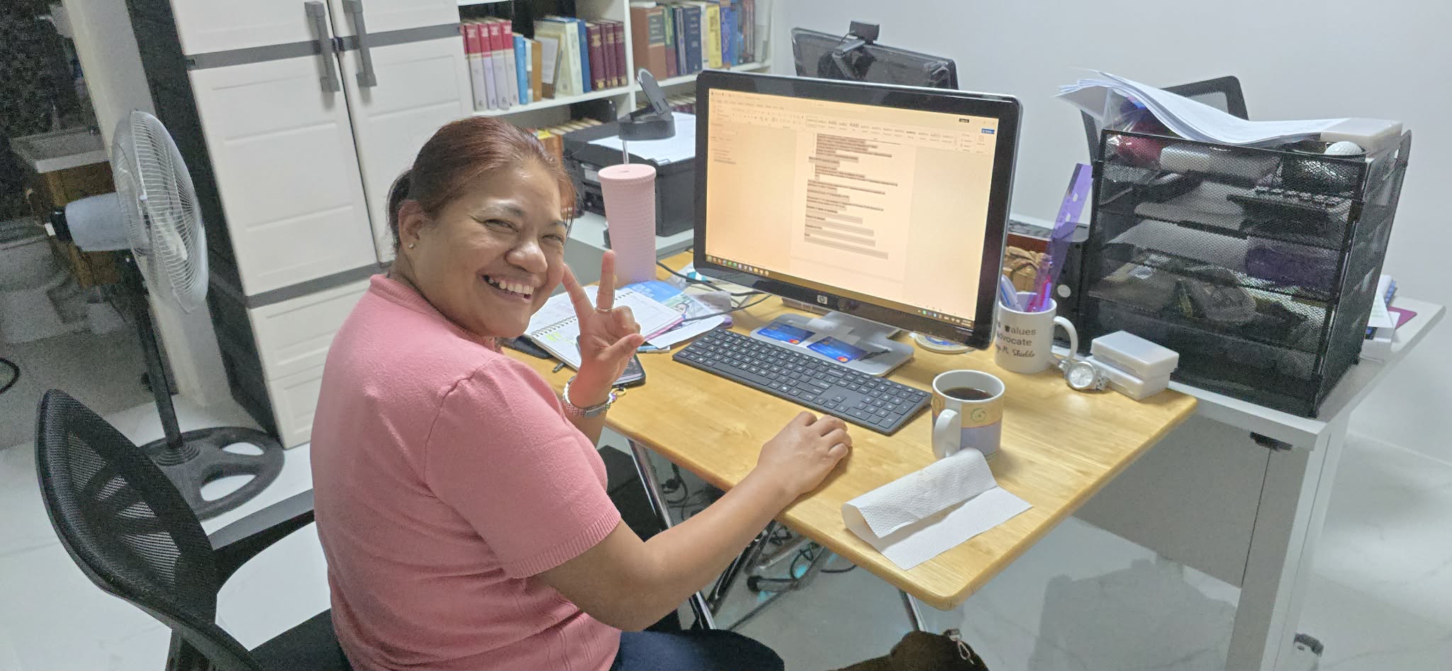 Rose serving in the Bringing Truth Ministries office